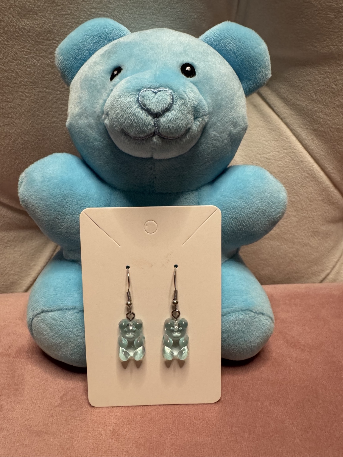 Blue bear plush with blue gummy bear earrings