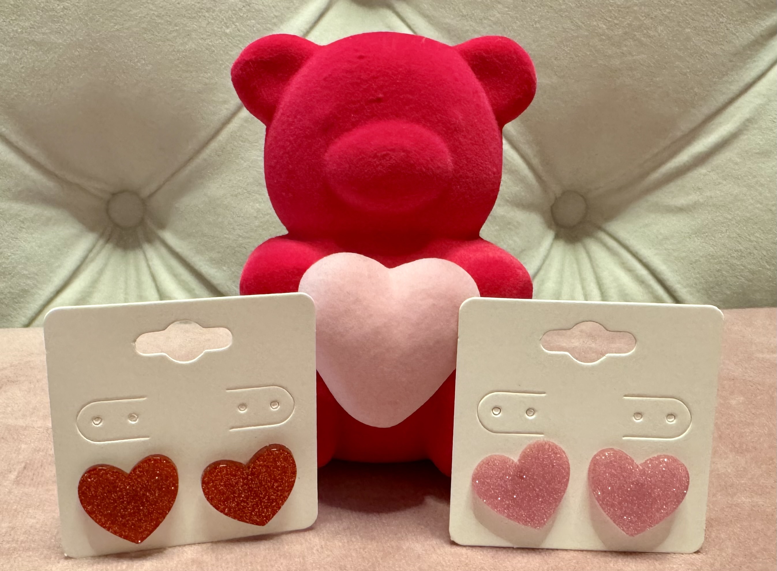 Red bear plush with glitter heart earrings